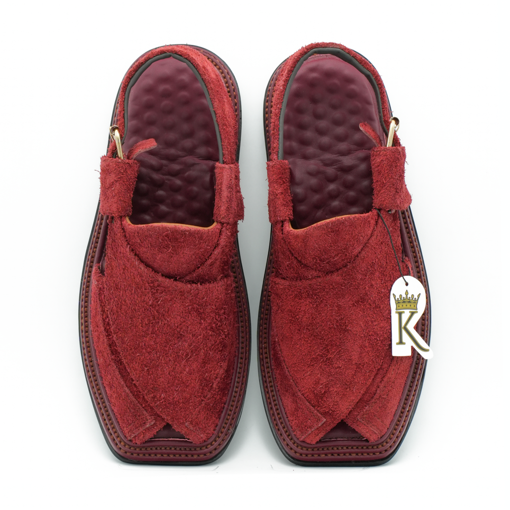 Close-up of the Armaghan Premium Triple Gear by KHAN THE BRAND, showcasing detailed craftsmanship and metallic finish.