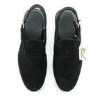 Khan The Brand Torkham Step Ahead sneaker, black and white athletic shoes with sporty design and lace-up style.