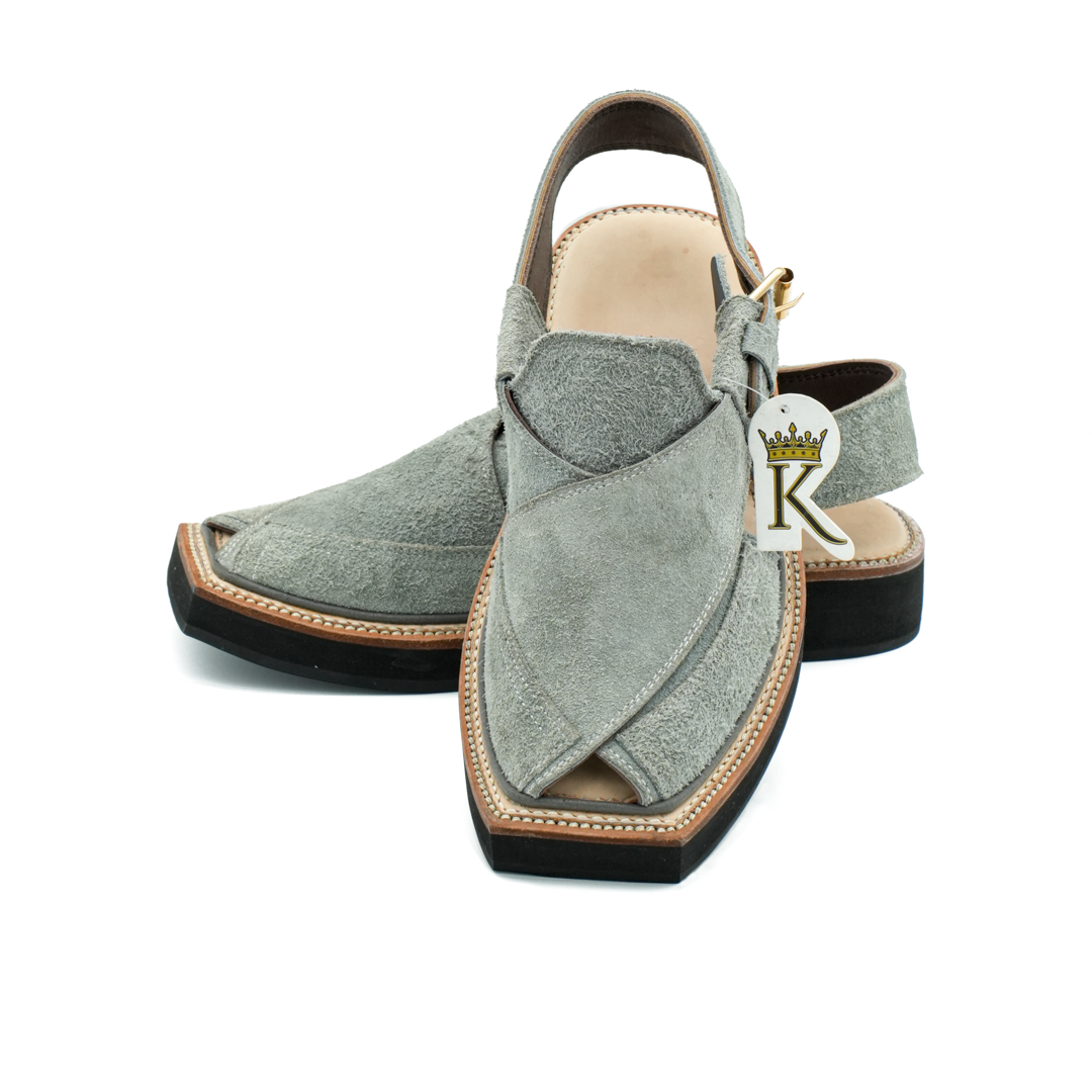 Close-up of KHAN THE BRAND Bakht Suede Classic Kaptan featuring rich suede material and traditional craftsmanship details.